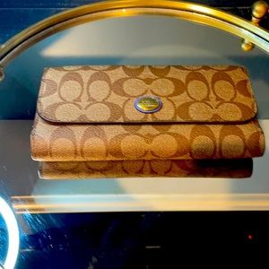 Cute tri fold coach wallet purple inside